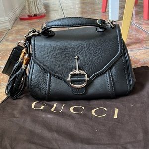 Gucci black leather bag with removable strap in excellent condition.